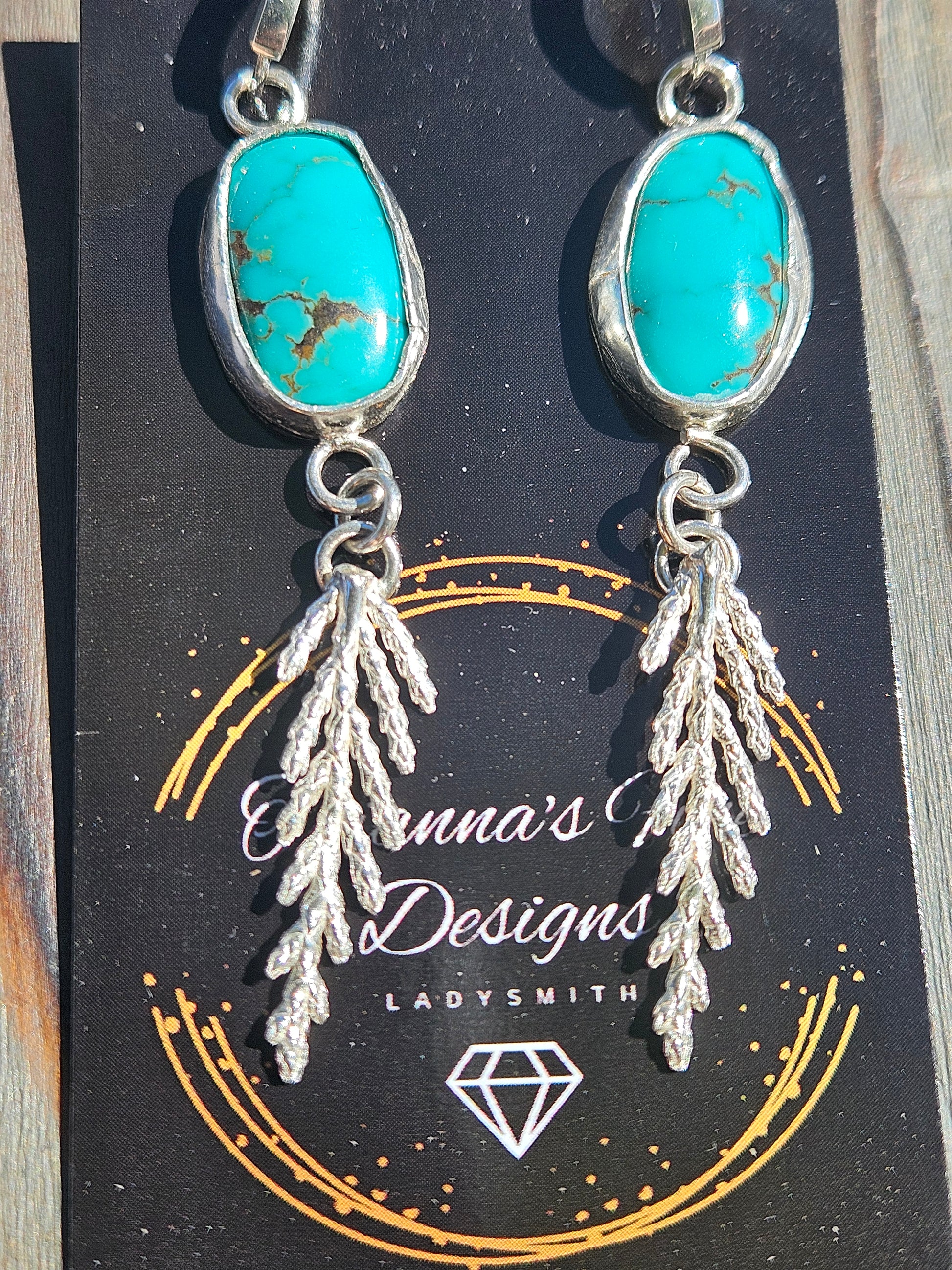 Custom-designed drop earrings crafted in Colorado
